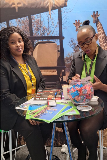 PML representative engaging at a travel exhibition