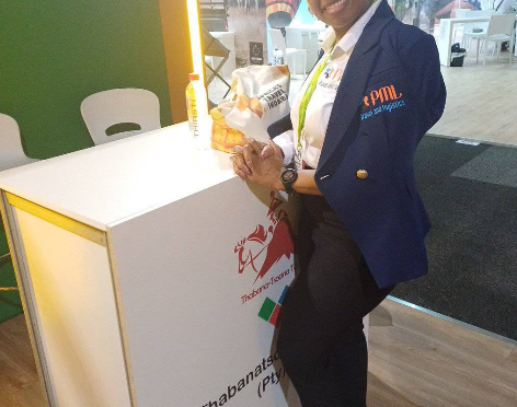 PML representative at a travel exhibition stand